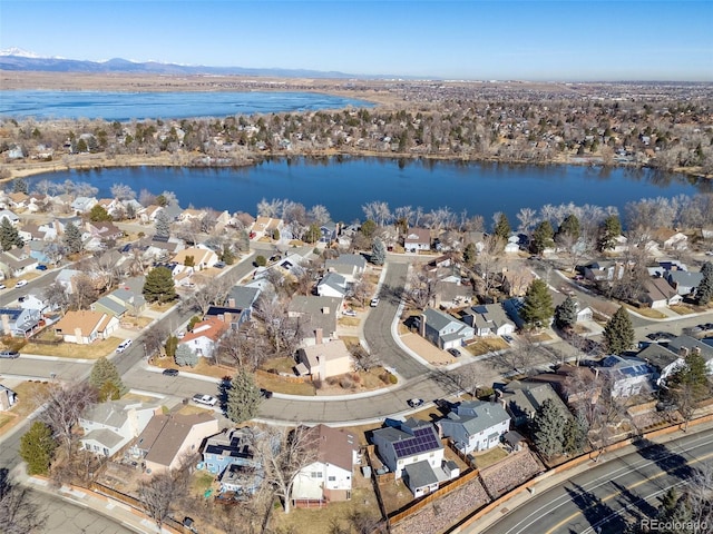 aerial view featuring a residential view and a water view