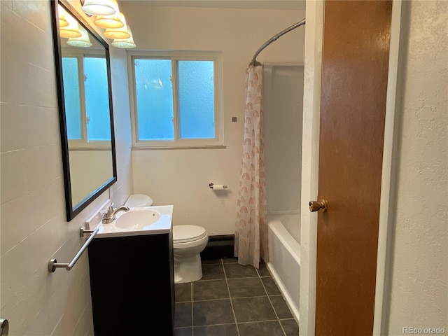 full bathroom featuring vanity, toilet, tile patterned floors, and shower / bath combo