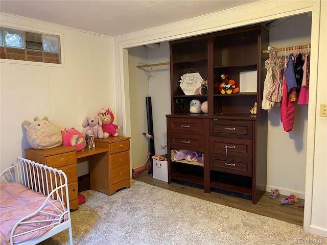 carpeted bedroom featuring a closet