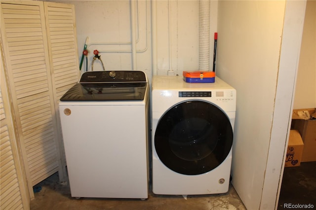 laundry area with independent washer and dryer