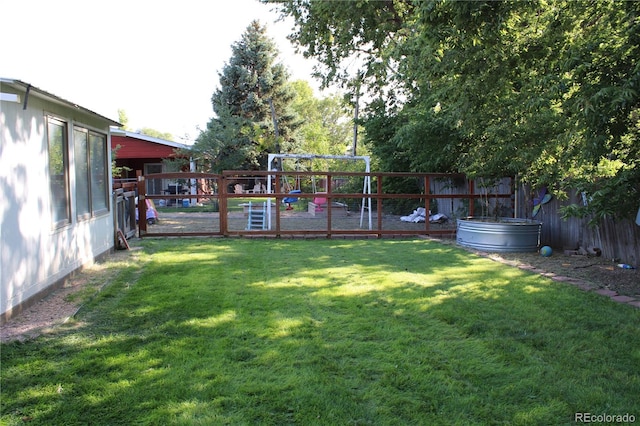 view of yard featuring a deck