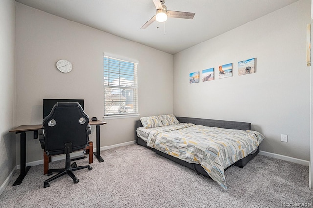 bedroom with ceiling fan, baseboards, and carpet