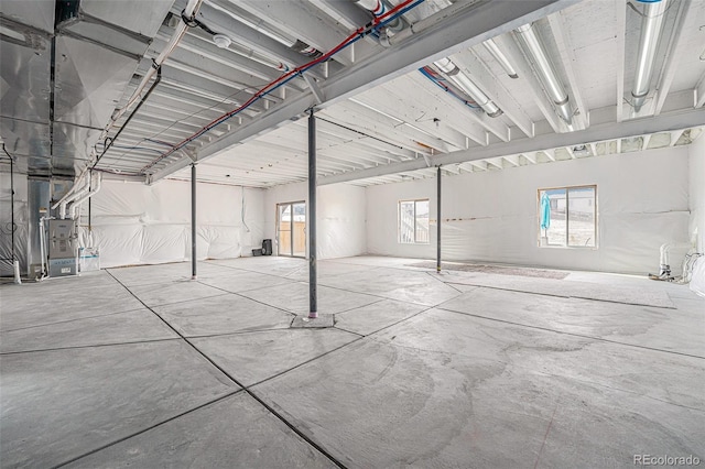 basement featuring heating unit