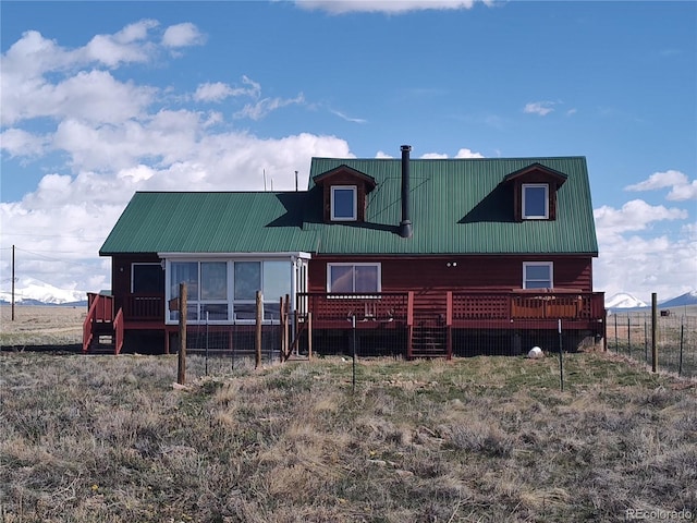 exterior space featuring a wooden deck