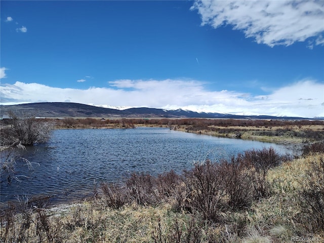 property view of water featuring a mountain view