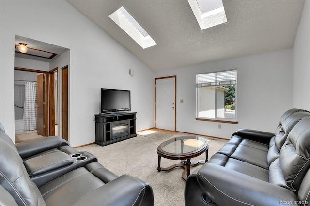 5056 E 112th Ct, Thornton, CO 80233 - living room with a skylight, light colored carpet, and high vaulted ceiling