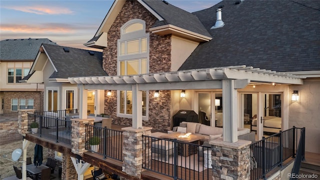 back of property with a pergola, fence, a patio, and roof with shingles