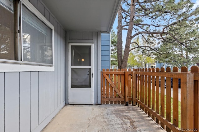 7220 S Gaylord St Unit G17, Littleton, CO 80122 - entrance to property with board and batten siding and a patio