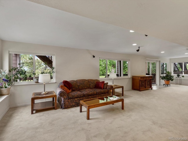 5660 S Eaton St, Littleton, CO 80123 - carpeted living room featuring healthy amount of natural light, recessed lighting, and baseboards
