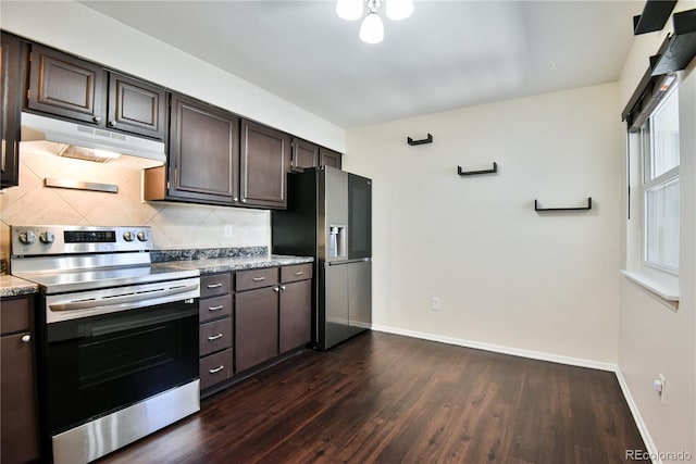 7185 S Gaylord St Unit A, Littleton, CO 80122 - kitchen featuring stainless steel appliances, under cabinet range hood, dark wood-type flooring, decorative backsplash, and dark brown cabinets