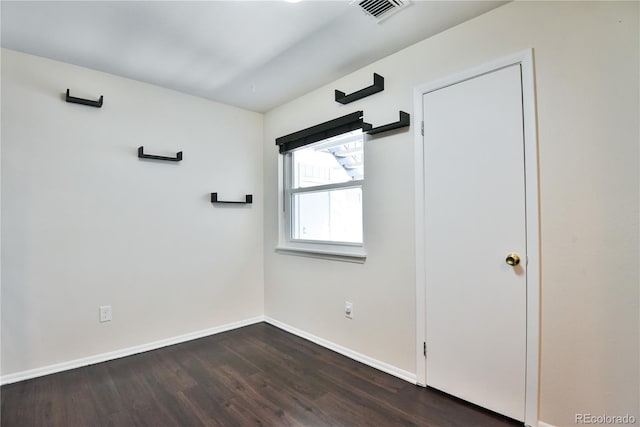 7185 S Gaylord St Unit A, Littleton, CO 80122 - spare room with wood finished floors and baseboards