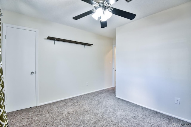 7185 S Gaylord St Unit A, Littleton, CO 80122 - carpeted empty room featuring a ceiling fan and baseboards
