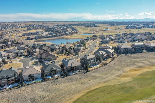 aerial view with a water view and a residential view