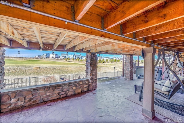 view of patio / terrace featuring fence