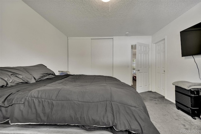 2279 S Lewiston St, Aurora, CO 80013 - carpeted bedroom with a textured ceiling and a closet