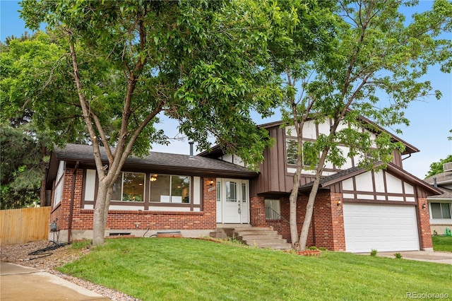 13052 W Asbury Pl, Lakewood, CO 80228 - view of front of home featuring brick siding, concrete driveway, board and batten siding, and an attached garage