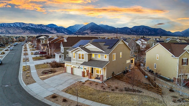 exterior space featuring a mountain view and a residential view