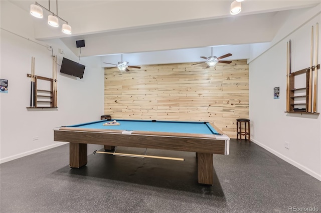 playroom with pool table, wooden walls, and ceiling fan