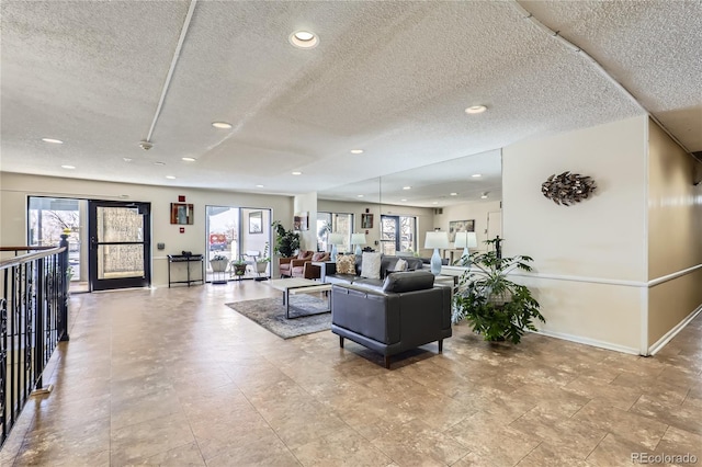 living room featuring a textured ceiling