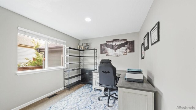 10052 Sage Sparrow Ct, Highlands Ranch, CO 80129 - office area featuring visible vents, light wood-style flooring, baseboards, and recessed lighting