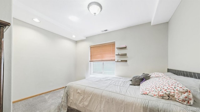 carpeted bedroom with baseboards, visible vents, and recessed lighting
