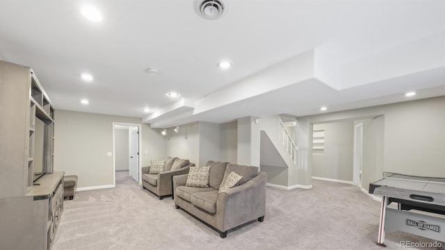 living area featuring stairs, light carpet, baseboards, and recessed lighting