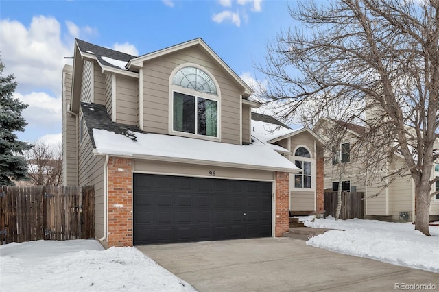 view of front of home with a garage