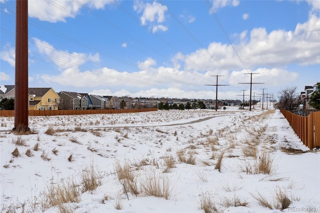 view of yard covered in snow