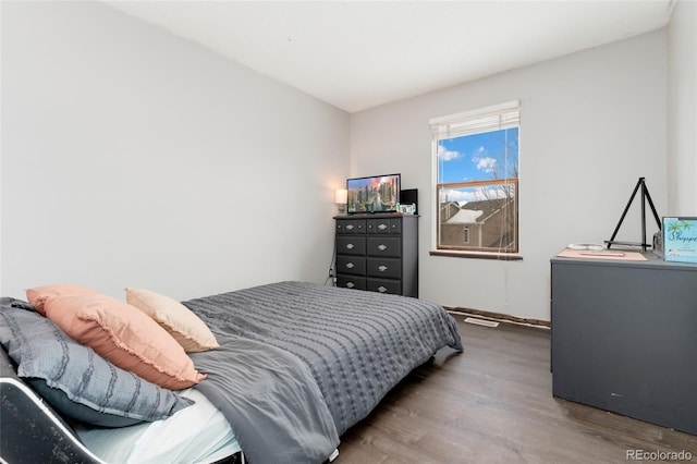 bedroom featuring hardwood / wood-style flooring