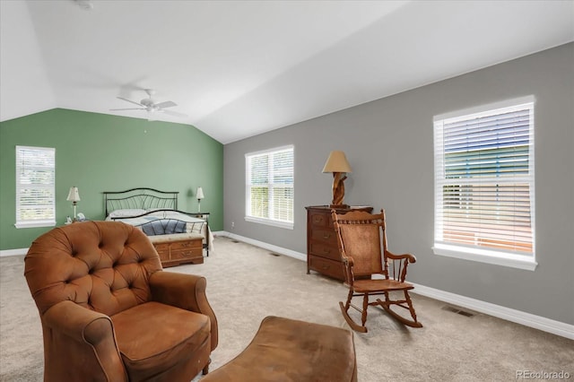 bedroom featuring baseboards, visible vents, and light colored carpet