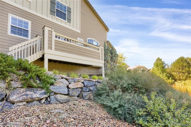 view of property exterior with board and batten siding