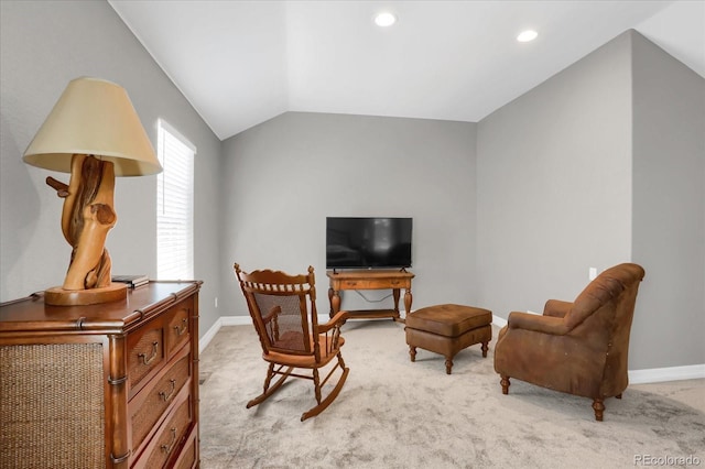 sitting room featuring recessed lighting, light colored carpet, vaulted ceiling, and baseboards