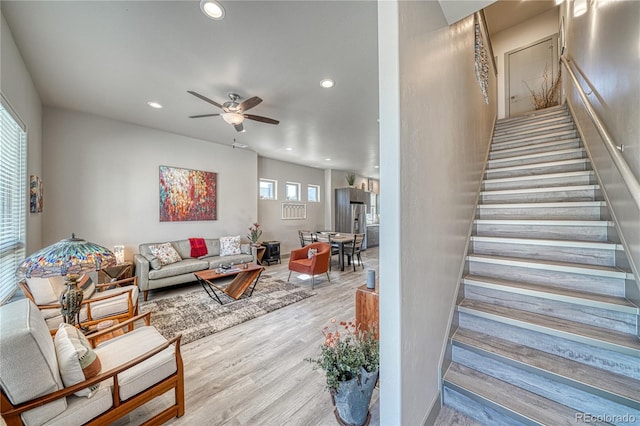 1139 Agate Ln, Poncha Springs, CO 81242 - living area with recessed lighting, wood finished floors, ceiling fan, and stairs