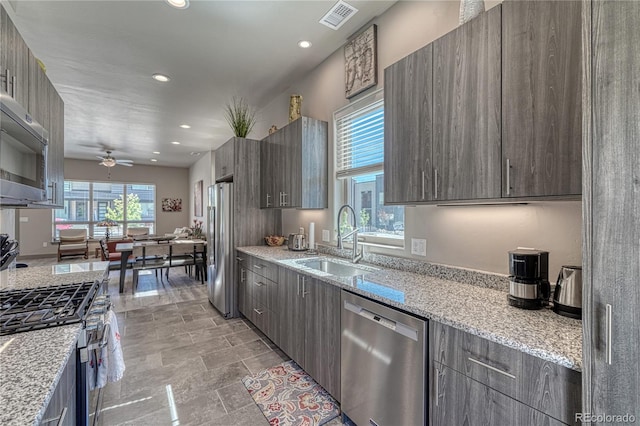 1139 Agate Ln, Poncha Springs, CO 81242 - kitchen featuring appliances with stainless steel finishes, a sink, a ceiling fan, modern cabinets, and recessed lighting