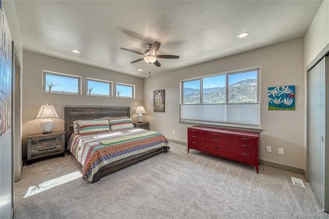 1139 Agate Ln, Poncha Springs, CO 81242 - carpeted bedroom with baseboards, recessed lighting, a ceiling fan, and a closet