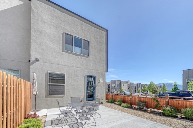 1139 Agate Ln, Poncha Springs, CO 81242 - rear view of property featuring a patio and stucco siding