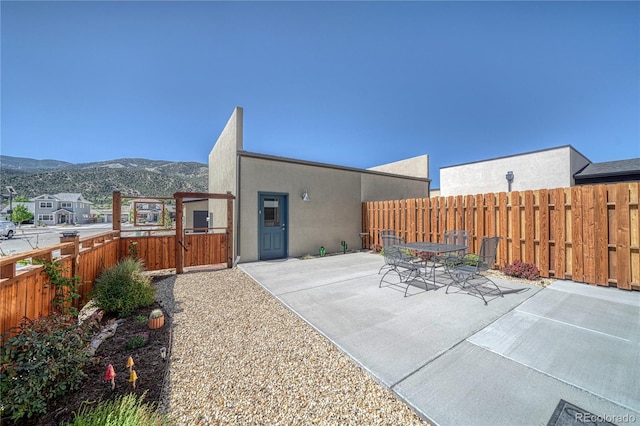 1139 Agate Ln, Poncha Springs, CO 81242 - view of patio featuring a mountain view and outdoor dining area