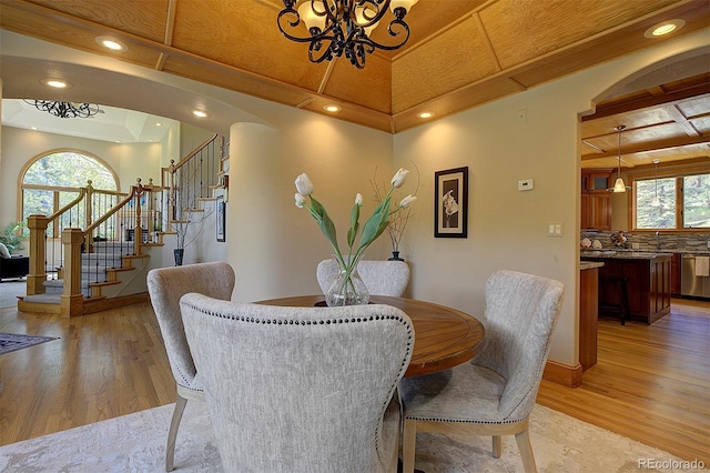2191 Baldy Ln, Evergreen, CO 80439 - dining area featuring a chandelier, stairway, light wood-style floors, and recessed lighting