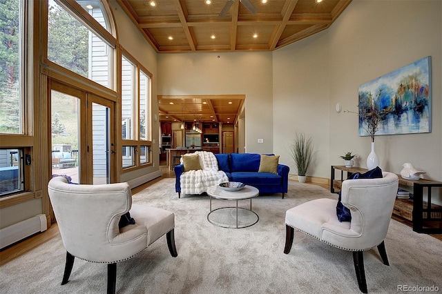 2191 Baldy Ln, Evergreen, CO 80439 - living area featuring a high ceiling, coffered ceiling, recessed lighting, beamed ceiling, and light wood finished floors