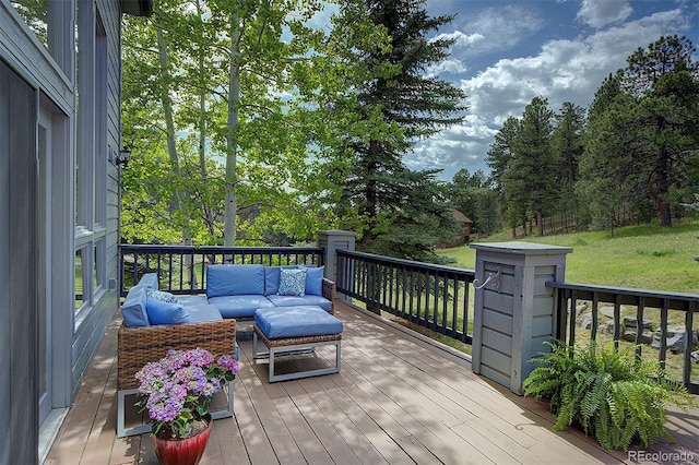 2191 Baldy Ln, Evergreen, CO 80439 - deck featuring an outdoor living space and view of scattered trees
