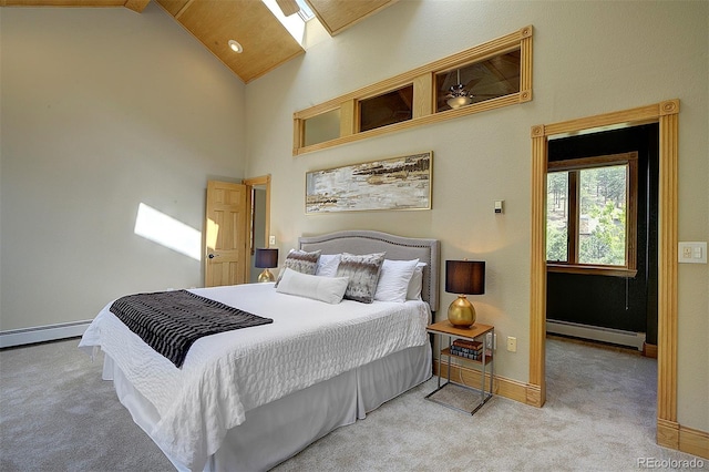 2191 Baldy Ln, Evergreen, CO 80439 - carpeted bedroom with baseboard heating and high vaulted ceiling