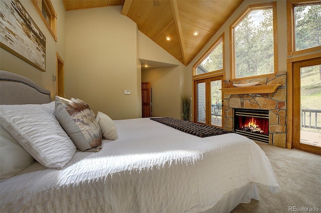 2191 Baldy Ln, Evergreen, CO 80439 - bedroom featuring light carpet, high vaulted ceiling, multiple windows, a fireplace, and wood ceiling