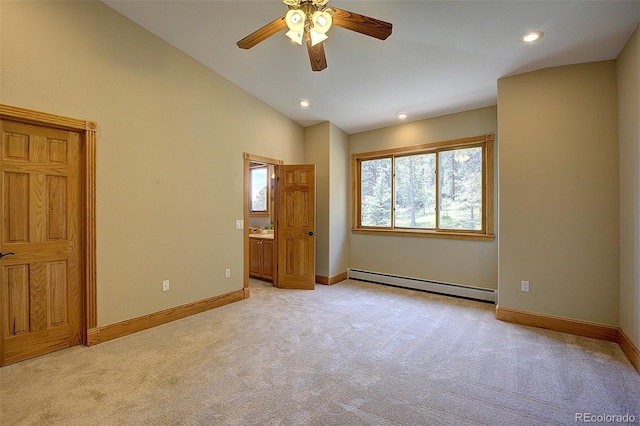 2191 Baldy Ln, Evergreen, CO 80439 - spare room with a baseboard radiator, light colored carpet, ceiling fan, vaulted ceiling, and recessed lighting