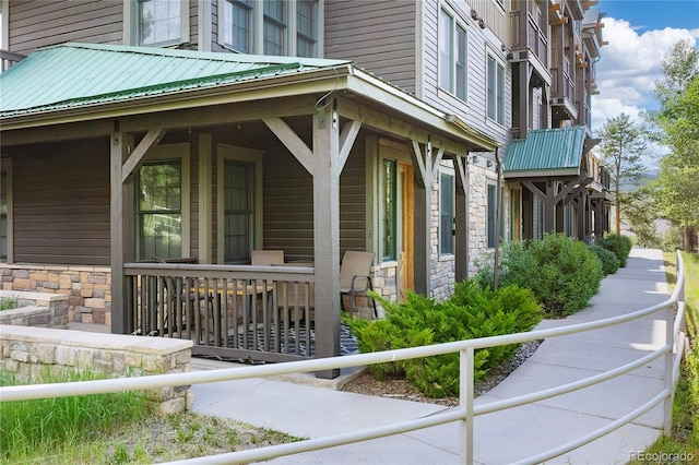 2104 Blue Sky Trl Unit 2-104, Granby, CO 80446 - view of property exterior with stone siding and a porch
