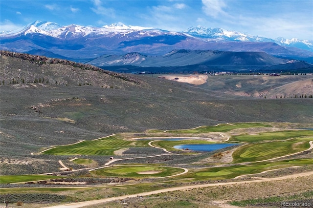2104 Blue Sky Trl Unit 2-104, Granby, CO 80446 - view of mountain background featuring a local golf course and a nearby body of water