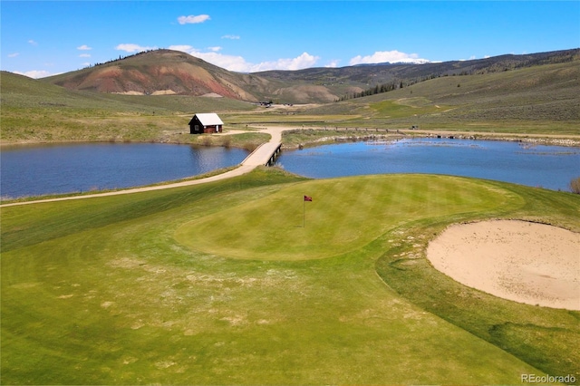2104 Blue Sky Trl Unit 2-104, Granby, CO 80446 - view of community featuring a water and mountain view and view of golf course