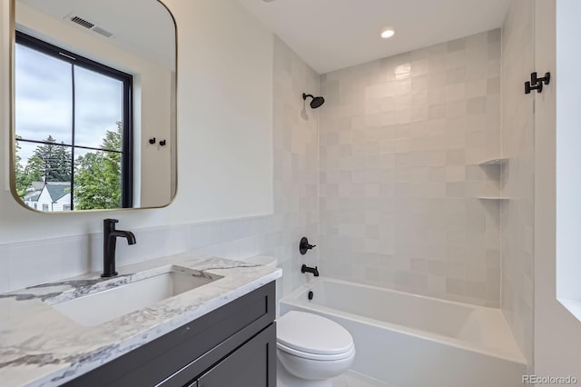 3019 Chase St, Wheat Ridge, CO 80214 - bathroom featuring vanity, toilet, shower / bath combination, and recessed lighting