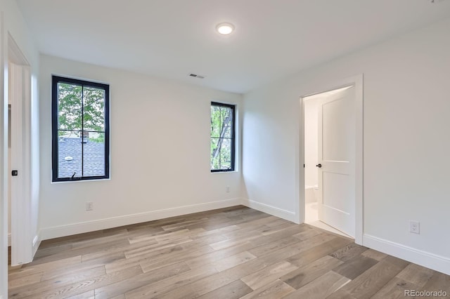 3019 Chase St, Wheat Ridge, CO 80214 - unfurnished bedroom featuring light wood-type flooring and baseboards