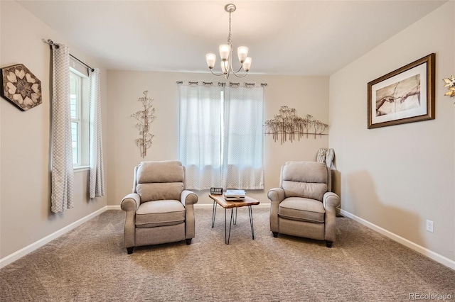 sitting room with an inviting chandelier, carpet, and baseboards