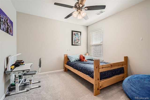 bedroom featuring baseboards, carpet, visible vents, and a ceiling fan